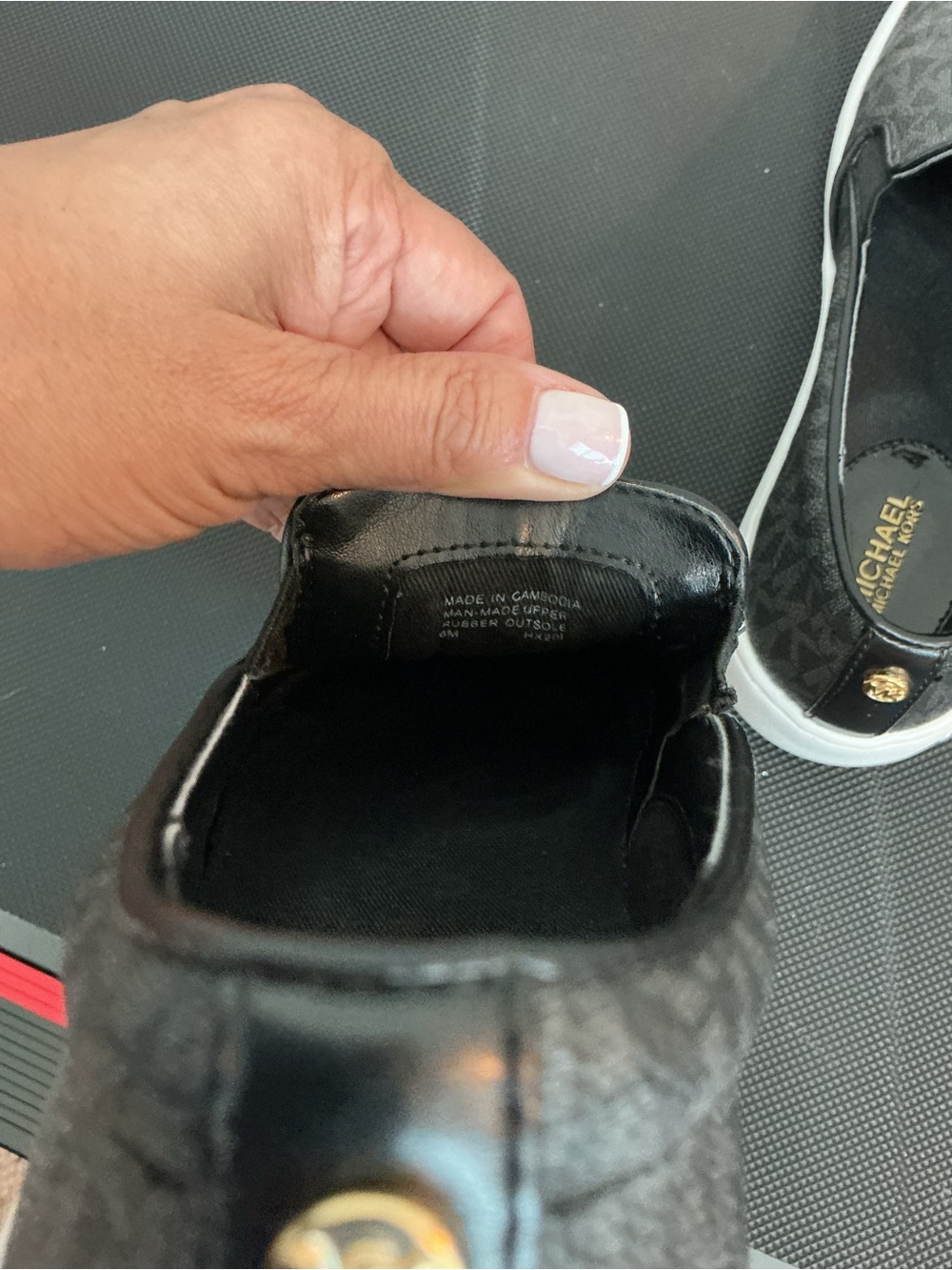 Michael Kors Black Logo-Print Slip-On Sneakers with Gold Accent